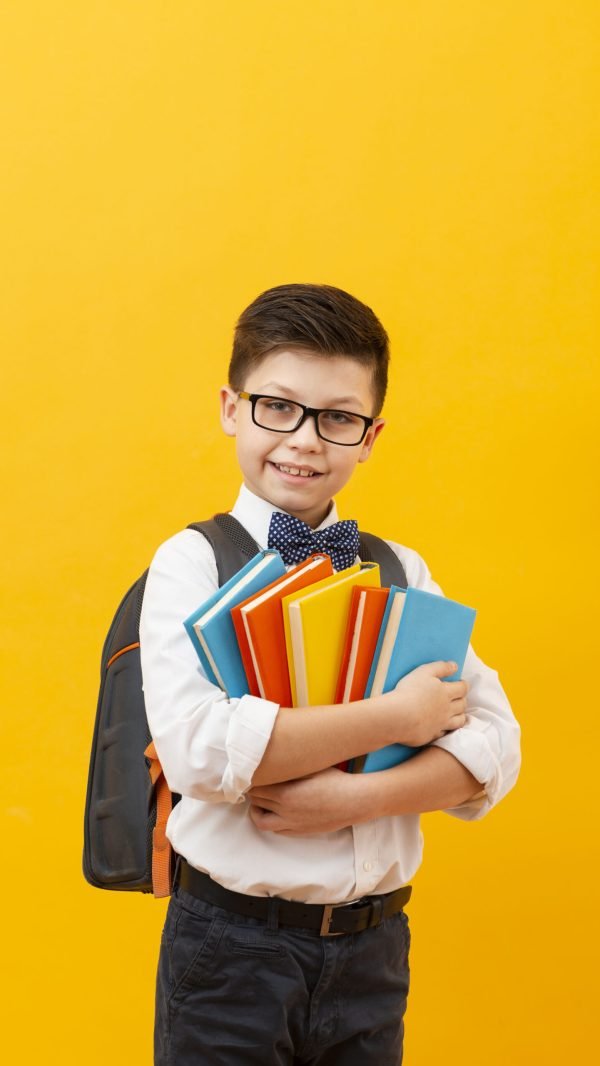 boy-with-backpack-holding-stack-books