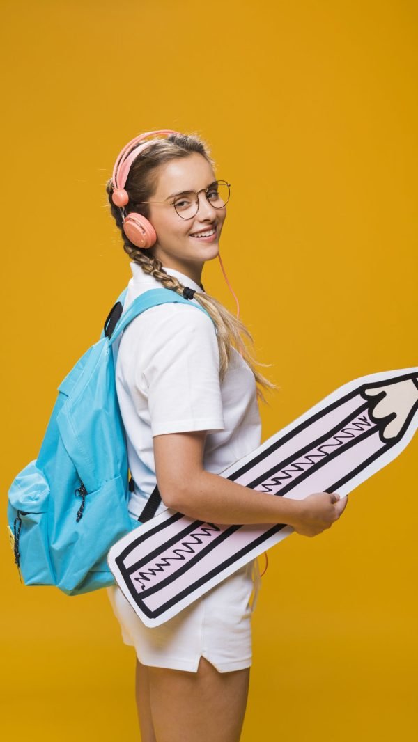 portrait-schoolgirl-yellow-background
